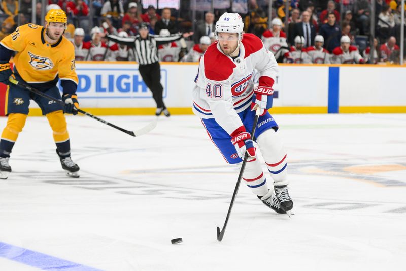 Apr 6, 2025; Nashville, Tennessee, USA; Montreal Canadiens right wing Joel Armia (40) skates with the puck against the Nashville Predators during the third period at Bridgestone Arena. Mandatory Credit: Steve Roberts-Imagn Images