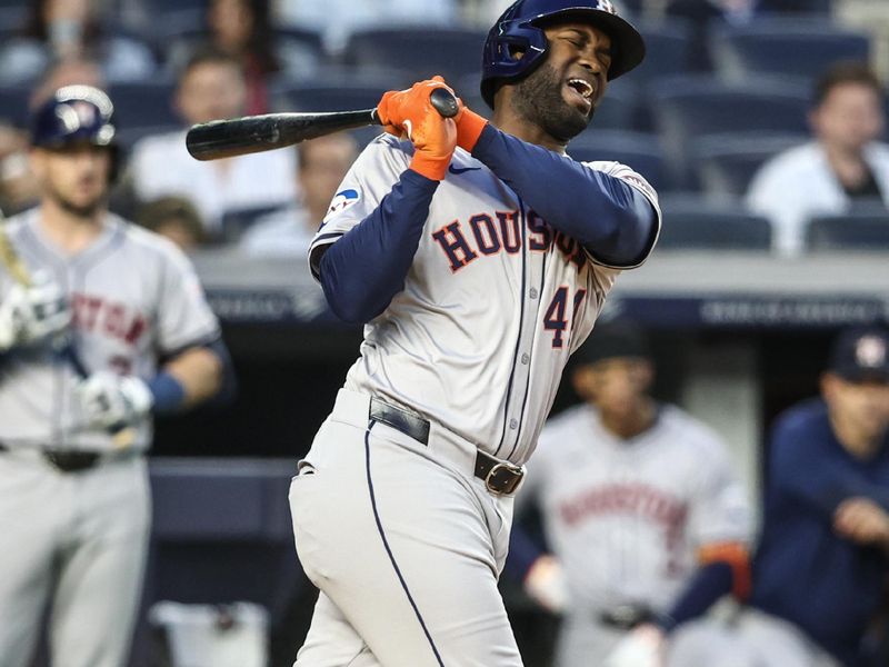 May 7, 2024; Bronx, New York, USA;  Houston Astros designated hitter Yordan Alvarez (44) reacts after fouling a ball off his leg in the third inning against the New York Yankees at Yankee Stadium. Mandatory Credit: Wendell Cruz-USA TODAY Sports