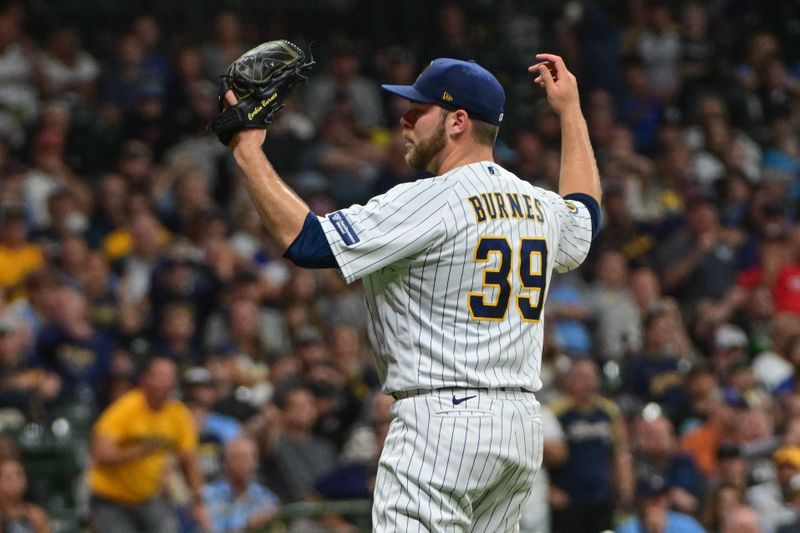 Sep 16, 2023; Milwaukee, Wisconsin, USA; Milwaukee Brewers pitcher Corbin Burnes (39) reacts after walking Washington Nationals second baseman Luis Garcia (not pictured) with the bases loaded to force in a run in the sixth inning at American Family Field. Mandatory Credit: Benny Sieu-USA TODAY Sports