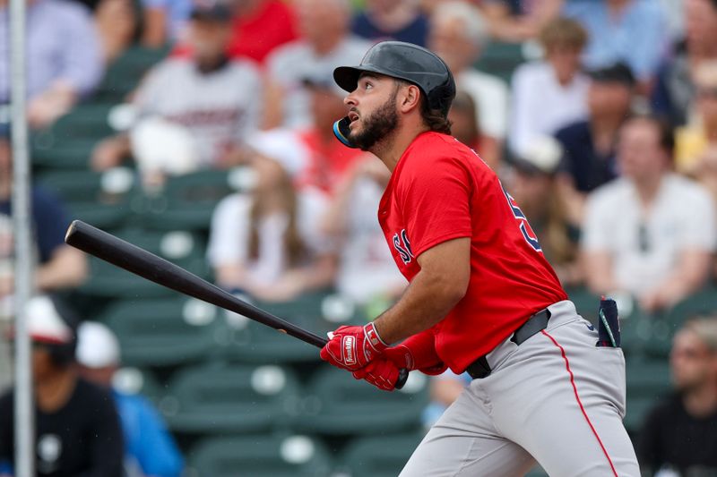 Mar 6, 2024; Fort Myers, Florida, USA;  Boston Red Sox right fielder Wilyer Abreu (52) hits a solo home run against the Minnesota Twins in the second inning at Hammond Stadium. Mandatory Credit: Nathan Ray Seebeck-USA TODAY Sports