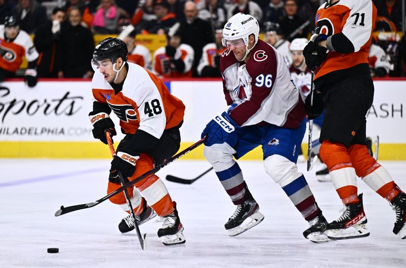 Jan 20, 2024; Philadelphia, Pennsylvania, USA; Colorado Avalanche right wing Mikko Rantanen (96) reaches in against Philadelphia Flyers center Morgan Frost (48) in the third period at Wells Fargo Center. Mandatory Credit: Kyle Ross-USA TODAY Sports