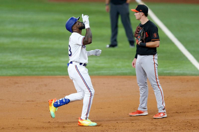 Oct 10, 2023; Arlington, Texas, USA; Texas Rangers right fielder Adolis Garcia (53) reacts after hitting a single in the first inning against the Baltimore Orioles during game three of the ALDS for the 2023 MLB playoffs at Globe Life Field. Mandatory Credit: Andrew Dieb-USA TODAY Sports