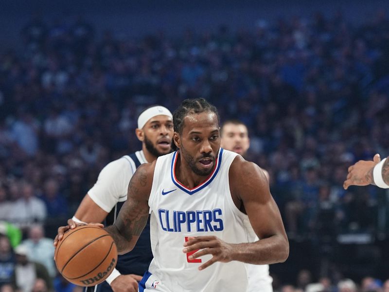 DALLAS, TX - APRIL 26: Kawhi Leonard #2 of the LA Clippers dribbles the ball during the game against the Dallas Mavericks during Round 1 Game 3 of the 2024 NBA Playoffs on April 26, 2024 at the American Airlines Center in Dallas, Texas. NOTE TO USER: User expressly acknowledges and agrees that, by downloading and or using this photograph, User is consenting to the terms and conditions of the Getty Images License Agreement. Mandatory Copyright Notice: Copyright 2023 NBAE (Photo by Glenn James/NBAE via Getty Images)