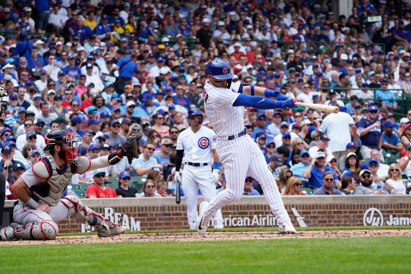 Jul 15, 2023; Chicago, Illinois, USA; Chicago Cubs shortstop Nico Hoerner (2) hits a one run single against the Boston Red Sox during the third inning at Wrigley Field. Mandatory Credit: David Banks-USA TODAY Sports