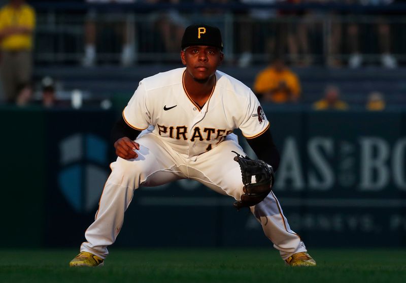 Sep 5, 2023; Pittsburgh, Pennsylvania, USA; Pittsburgh Pirates third baseman Ke'Bryan Hayes (13) in the field against the Milwaukee Brewers during the third inning at PNC Park. Mandatory Credit: Charles LeClaire-USA TODAY Sports