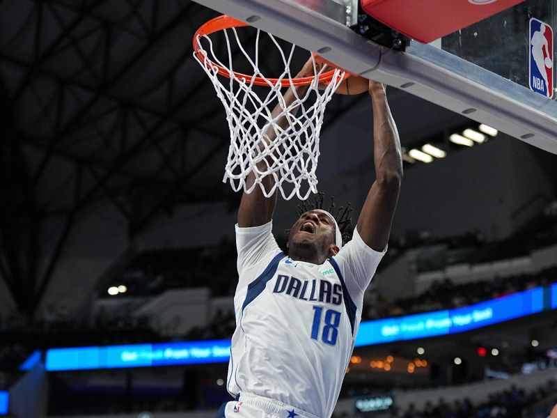 DALLAS, TX - OCTOBER 20: Olivier Maxence-Prosper #18 of the Dallas Mavericks dunks the ball during the game against the Detroit Pistons on October 20, 2023 at the American Airlines Center in Dallas, Texas. NOTE TO USER: User expressly acknowledges and agrees that, by downloading and or using this photograph, User is consenting to the terms and conditions of the Getty Images License Agreement. Mandatory Copyright Notice: Copyright 2023 NBAE (Photo by Glenn James/NBAE via Getty Images)