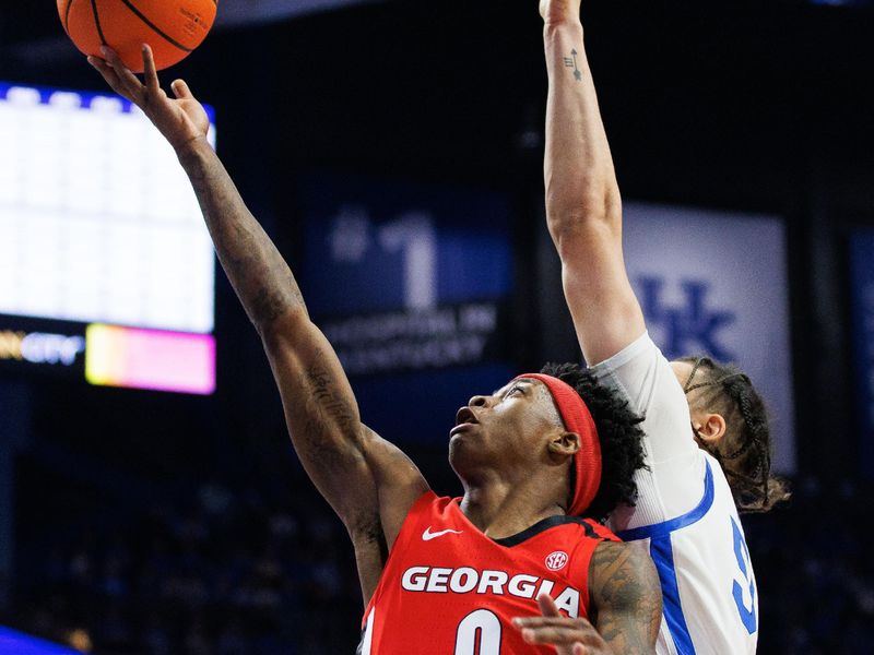 Jan 17, 2023; Lexington, Kentucky, USA; Georgia Bulldogs guard Terry Roberts (0) goes to the basket during the first half against the Kentucky Wildcats at Rupp Arena at Central Bank Center. Mandatory Credit: Jordan Prather-USA TODAY Sports