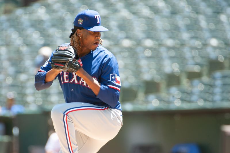 May 7, 2024; Oakland, California, USA; Texas Rangers pitcher José Ureña (54) throws against the Oakland Athletics during the first inning at Oakland-Alameda County Coliseum. Mandatory Credit: Ed Szczepanski-USA TODAY Sports