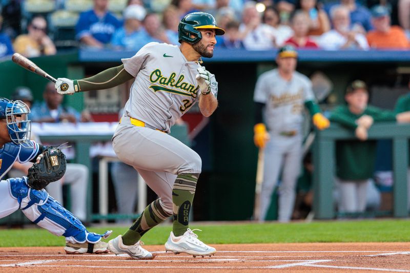 May 18, 2024; Kansas City, Missouri, USA; Oakland Athletics second base Abraham Toro (31) gets a base hit during the first inning against the Kansas City Royals at Kauffman Stadium. Mandatory Credit: William Purnell-USA TODAY Sports