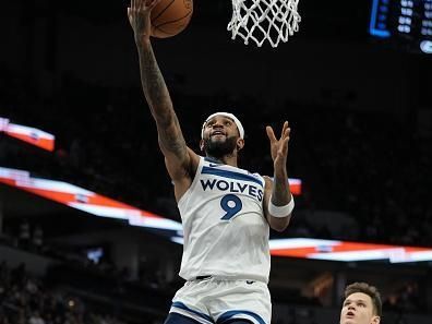 MINNEAPOLIS, MN -  NOVEMBER 30 :  Nickeil Alexander-Walker #9 of the Minnesota Timberwolves drives to the basket during the game against the Utah Jazz on November 30, 2023 at Target Center in Minneapolis, Minnesota. NOTE TO USER: User expressly acknowledges and agrees that, by downloading and or using this Photograph, user is consenting to the terms and conditions of the Getty Images License Agreement. Mandatory Copyright Notice: Copyright 2023 NBAE (Photo by Jordan Johnson/NBAE via Getty Images)