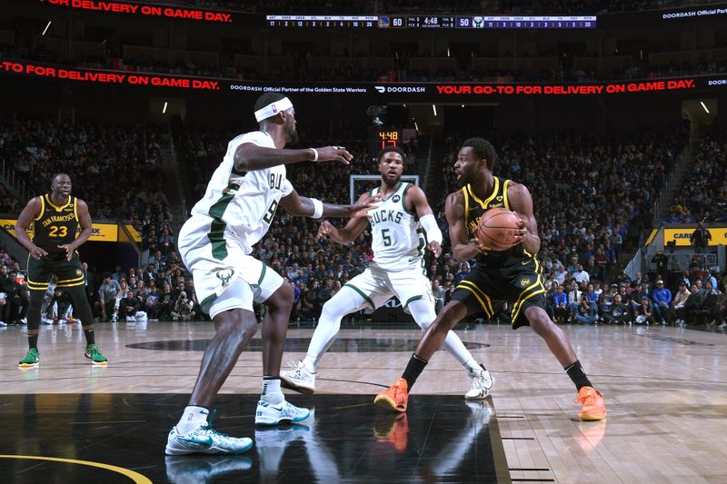 SAN FRANCISCO, CA - MARCH 6:  Andrew Wiggins #22 of the Golden State Warriors handles the ball during the game against the Milwaukee Bucks on MARCH 6, 2024 at Chase Center in San Francisco, California. NOTE TO USER: User expressly acknowledges and agrees that, by downloading and or using this photograph, user is consenting to the terms and conditions of Getty Images License Agreement. Mandatory Copyright Notice: Copyright 2024 NBAE (Photo by Noah Graham/NBAE via Getty Images)