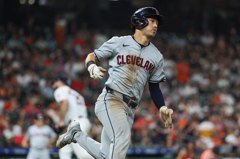 May 1, 2024; Houston, Texas, USA;  Cleveland Guardians left fielder Steven Kwan (38) runs to first base on an RBI double during the fifth inning against the Houston Astros at Minute Maid Park. Mandatory Credit: Troy Taormina-USA TODAY Sports