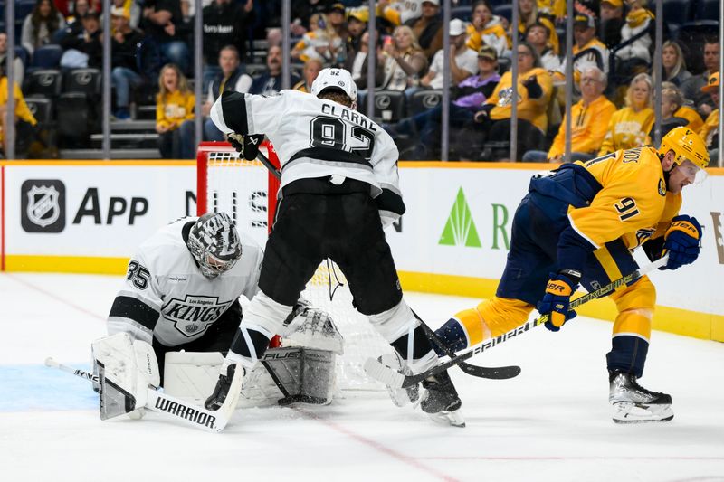 Nov 4, 2024; Nashville, Tennessee, USA;  Los Angeles Kings goaltender Darcy Kuemper (35) blocks the shot of Nashville Predators center Steven Stamkos (91) during the third period at Bridgestone Arena. Mandatory Credit: Steve Roberts-Imagn Images