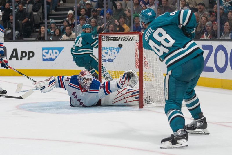 Jan 23, 2024; San Jose, California, USA; San Jose Sharks center Tomas Hertl (48) shoots the puck past New York Rangers goaltender Igor Shesterkin (31) during overtime to win the game at SAP Center at San Jose. Mandatory Credit: Stan Szeto-USA TODAY Sports