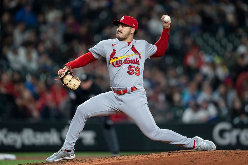 Apr 21, 2023; Seattle, Washington, USA; St. Louis Cardinals reliever JoJo Romero (59) delivers a pitch seventh inning against the Seattle Mariners at T-Mobile Park. Mandatory Credit: Stephen Brashear-USA TODAY Sports