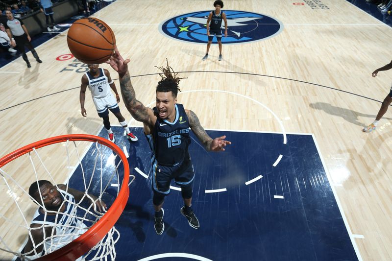 MINNEAPOLIS, MN -  JANUARY 11:  Brandon Clarke #15 of the Memphis Grizzlies shoots the ball during the game against the Minnesota Timberwolves on January 11, 2025 at Target Center in Minneapolis, Minnesota. NOTE TO USER: User expressly acknowledges and agrees that, by downloading and or using this Photograph, user is consenting to the terms and conditions of the Getty Images License Agreement. Mandatory Copyright Notice: Copyright 2025 NBAE (Photo by David Sherman/NBAE via Getty Images)