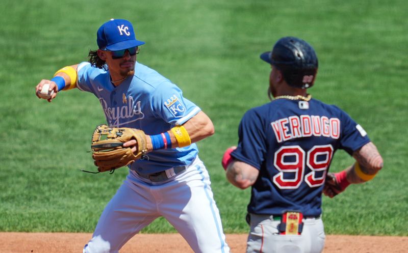 Sep 3, 2023; Kansas City, Missouri, USA; Kansas City Royals shortstop Bobby Witt Jr. (7) throws to first base as Boston Red Sox right fielder Alex Verdugo (99) runs toward second base during the XXXX inning at Kauffman Stadium. Mandatory Credit: Jay Biggerstaff-USA TODAY Sports