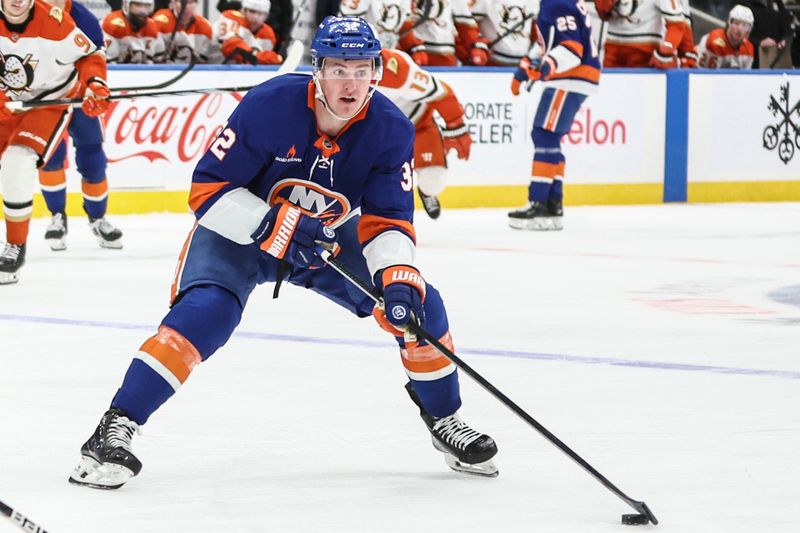 Oct 29, 2024; Elmont, New York, USA;  New York Islanders center Kyle MacLean (32) looks to make a pass in the second period against the Anaheim Ducks at UBS Arena. Mandatory Credit: Wendell Cruz-Imagn Images