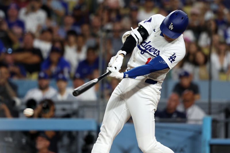 Sep 10, 2024; Los Angeles, California, USA;  Los Angeles Dodgers designated hitter Shohei Ohtani (17) grounds into a double play during the third inning against the Chicago Cubs at Dodger Stadium. Mandatory Credit: Kiyoshi Mio-Imagn Images