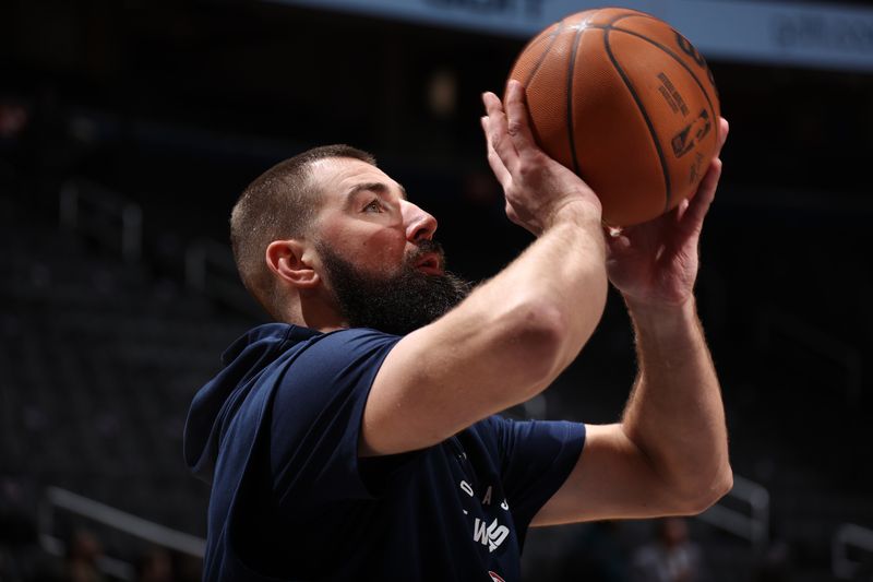 WASHINGTON, DC -? JANUARY 13: Jonas Valanciunas #17 of the Washington Wizards warms up before the game against the Minnesota Timberwolves  on January 13, 2025 at Capital One Arena in Washington, DC. NOTE TO USER: User expressly acknowledges and agrees that, by downloading and or using this Photograph, user is consenting to the terms and conditions of the Getty Images License Agreement. Mandatory Copyright Notice: Copyright 2025 NBAE (Photo by Stephen Gosling/NBAE via Getty Images)