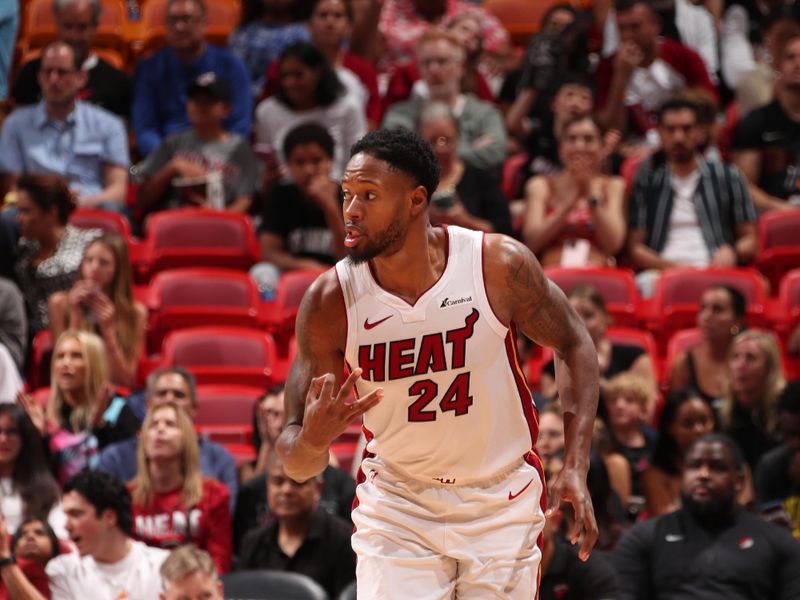 MIAMI, FL - MARCH 29: Haywood Highsmith #24 of the Miami Heat celebrates during the game against the Portland Trail Blazers on March 29, 2024 at Kaseya Center in Miami, Florida. NOTE TO USER: User expressly acknowledges and agrees that, by downloading and or using this Photograph, user is consenting to the terms and conditions of the Getty Images License Agreement. Mandatory Copyright Notice: Copyright 2024 NBAE (Photo by Issac Baldizon/NBAE via Getty Images)