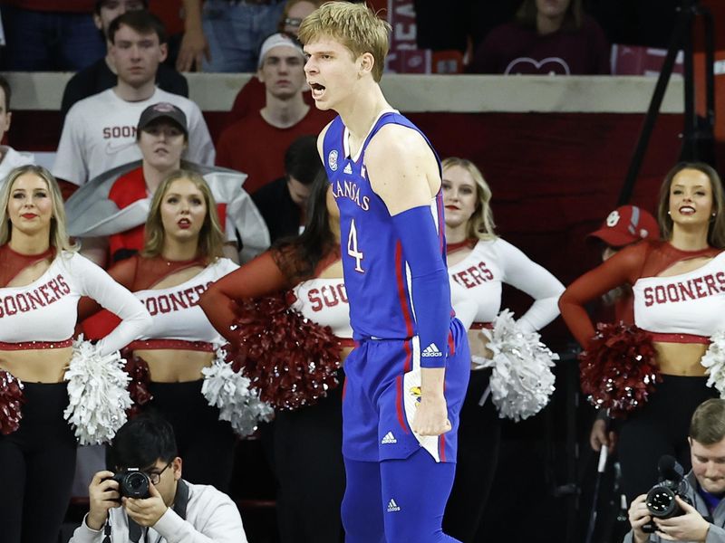 Feb 11, 2023; Norman, Oklahoma, USA; Kansas Jayhawks guard Gradey Dick (4) celebrates after a basket against the Oklahoma Sooners during the second half at Lloyd Noble Center. Kansas won 78-55. Mandatory Credit: Alonzo Adams-USA TODAY Sports