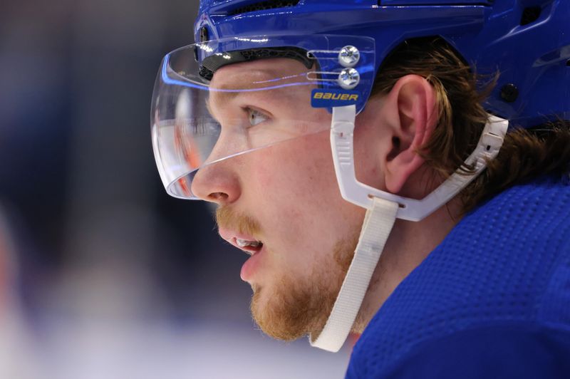 Apr 5, 2024; Buffalo, New York, USA;  Buffalo Sabres defenseman Bowen Byram (4) waits for the face-off during the first period against the Philadelphia Flyers at KeyBank Center. Mandatory Credit: Timothy T. Ludwig-USA TODAY Sports