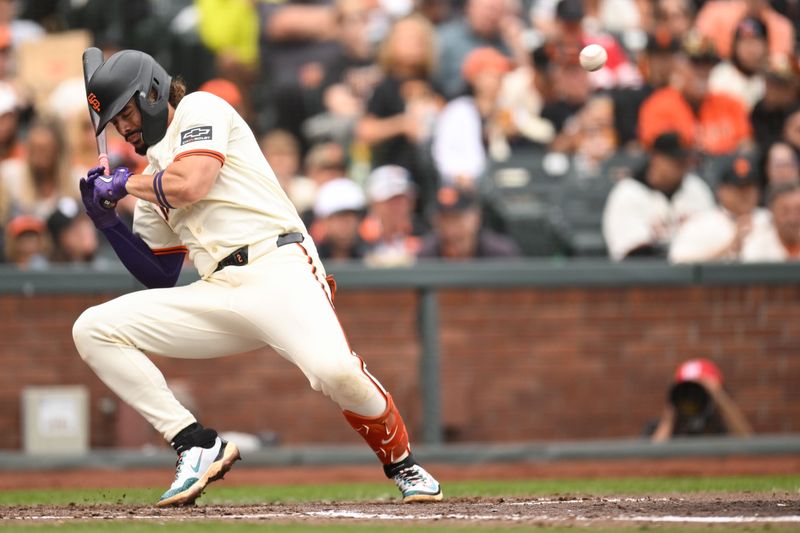 Sep 28, 2025; San Francisco, California, USA; San Francisco Giants shortstop Willy Adames (2) dodges a pitch from the Colorado Rockies in the fifth inning at Oracle Park. Mandatory Credit: Eakin Howard-Imagn Images