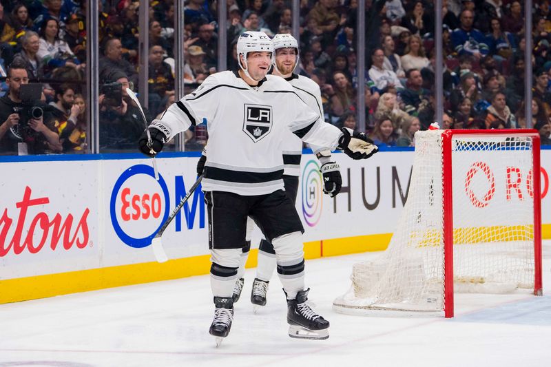 Feb 29, 2024; Vancouver, British Columbia, CAN; Los Angeles Kings forward Pierre-Luc Dubois (80) and forward Kevin Fiala (22) celebrate Fiala   s goal against the Vancouver Canucks in the third period at Rogers Arena. Kings won 5-1. Mandatory Credit: Bob Frid-USA TODAY Sports