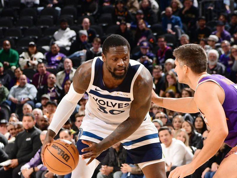 PHOENIX, AZ - JANUARY 29: Julius Randle #30 of the Minnesota Timberwolves dribbles the ball during the game against the Phoenix Suns on January 29, 2025 at Footprint Center in Phoenix, Arizona. NOTE TO USER: User expressly acknowledges and agrees that, by downloading and or using this photograph, user is consenting to the terms and conditions of the Getty Images License Agreement. Mandatory Copyright Notice: Copyright 2025 NBAE (Photo by Kate Frese/NBAE via Getty Images)