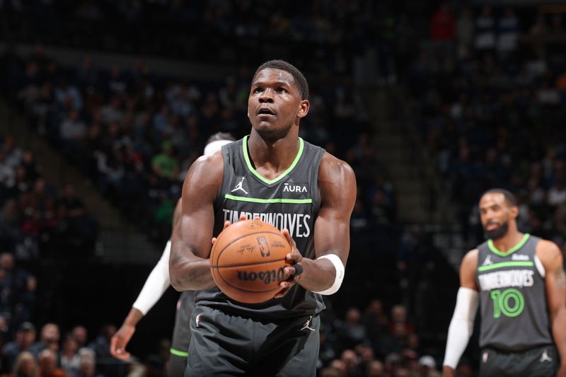 MINNEAPOLIS, MN -  APRIL 2:  Anthony Edwards #5 of the Minnesota Timberwolves shoots a free throw during the game aHouston Rockets on April 2, 2024 at Target Center in Minneapolis, Minnesota. NOTE TO USER: User expressly acknowledges and agrees that, by downloading and or using this Photograph, user is consenting to the terms and conditions of the Getty Images License Agreement. Mandatory Copyright Notice: Copyright 2024 NBAE (Photo by David Sherman/NBAE via Getty Images)