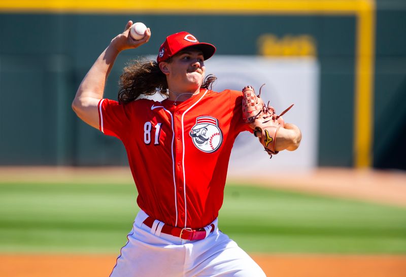 Mar 20, 2024; Goodyear, Arizona, USA; Cincinnati Reds pitcher Rhett Lowder against the Texas Rangers during a spring training baseball game at Goodyear Ballpark. Mandatory Credit: Mark J. Rebilas-USA TODAY Sports