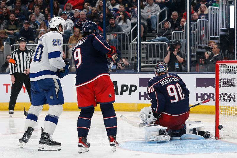 Feb 10, 2024; Columbus, Ohio, USA; Tampa Bay Lightning center Steven Stamkos (91) (not pictured ) shot goes into the net past Columbus Blue Jackets goalie Elvis Merzlikins (90) for a goal during the third period at Nationwide Arena. Mandatory Credit: Russell LaBounty-USA TODAY Sports