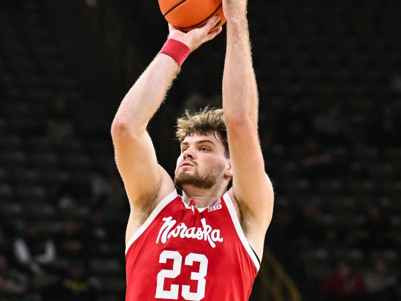 Jan 7, 2025; Iowa City, Iowa, USA; Nebraska Cornhuskers forward Andrew Morgan (23) shoots the ball against the Iowa Hawkeyes during the first half at Carver-Hawkeye Arena. Mandatory Credit: Jeffrey Becker-Imagn Images