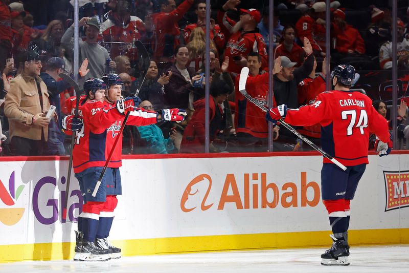 Jan 17, 2026; Washington, District of Columbia, USA; Washington Capitals defenseman Jakob Chychrun (6) celebrates with teammates after scoring a goal against the Florida Panthers during the second period at Capital One Arena. Mandatory Credit: Geoff Burke-Imagn Images