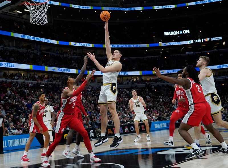 Mar 11, 2023; Chicago, IL, USA; Purdue Boilermakers center Zach Edey (15) takes a shot on Ohio State Buckeyes guard Eugene Brown III (3) during the first half at United Center. Mandatory Credit: David Banks-USA TODAY Sports