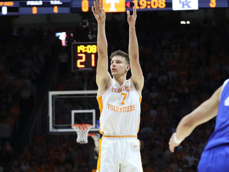 Jan 28, 2025; Knoxville, Tennessee, USA; Tennessee Volunteers forward Igor Milicic Jr. (7) shoots a three-point basket against the Kentucky Wildcats during the first half at Thompson-Boling Arena at Food City Center. Mandatory Credit: Randy Sartin-Imagn Images