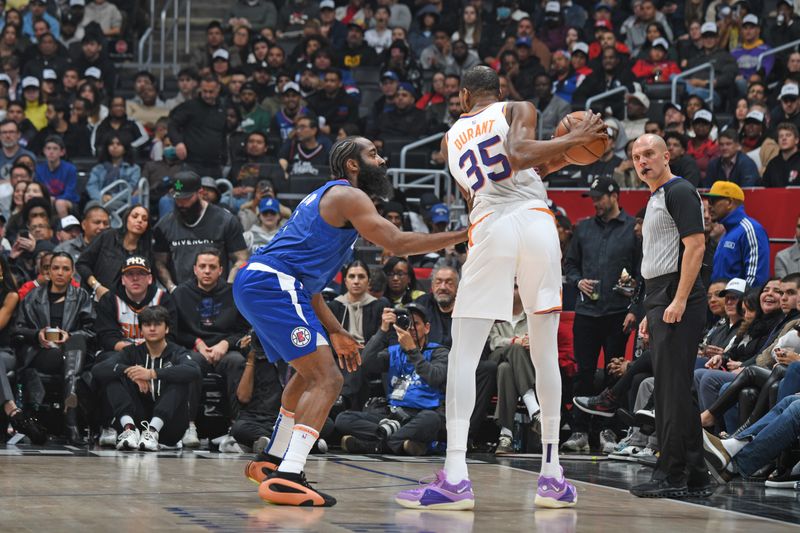 LOS ANGELES, CA - JANUARY 8: James Harden #1 of the LA Clippers plays defense against Kevin Durant #35 of the Phoenix Suns on January 8, 2024 at Crypto.Com Arena in Los Angeles, California. NOTE TO USER: User expressly acknowledges and agrees that, by downloading and/or using this Photograph, user is consenting to the terms and conditions of the Getty Images License Agreement. Mandatory Copyright Notice: Copyright 2024 NBAE (Photo by Andrew D. Bernstein/NBAE via Getty Images)