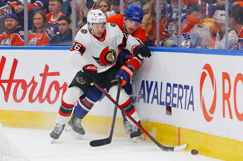 Jan 6, 2024; Edmonton, Alberta, CAN; Ottawa Senators defensemen Erik Brannstrom (26) and Edmonton Oilers forward Adam Erne (21) battle along the boards for a loose puck during the first period at Rogers Place. Mandatory Credit: Perry Nelson-USA TODAY Sports