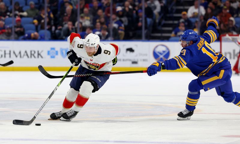 Feb 15, 2024; Buffalo, New York, USA;  Buffalo Sabres defenseman Henri Jokiharju (10) tries to defend as Florida Panthers center Sam Bennett (9) skates up ice with the puck during the third period at KeyBank Center. Mandatory Credit: Timothy T. Ludwig-USA TODAY Sports