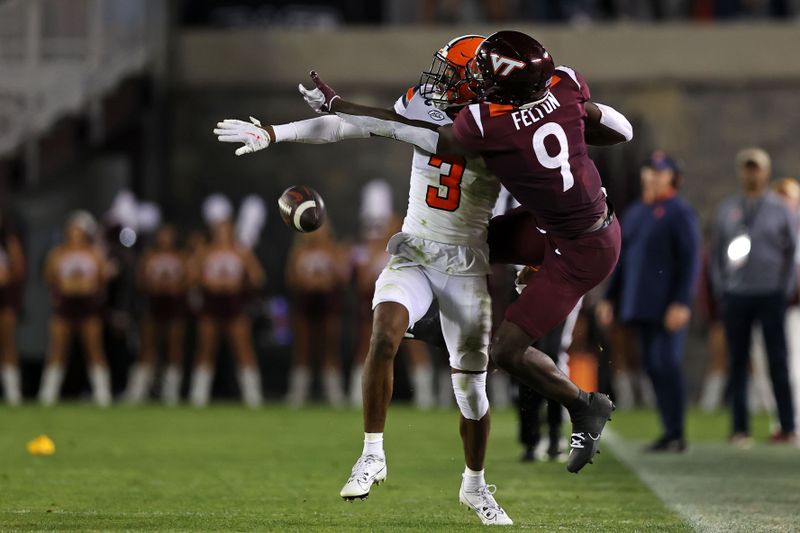 Oct 26, 2023; Blacksburg, Virginia, USA; Syracuse Orange defensive back Isaiah Johnson (3) is called for pass interference against Virginia Tech Hokies wide receiver Da'Quan Felton (9) during the second quarter at Lane Stadium. Mandatory Credit: Peter Casey-USA TODAY Sports