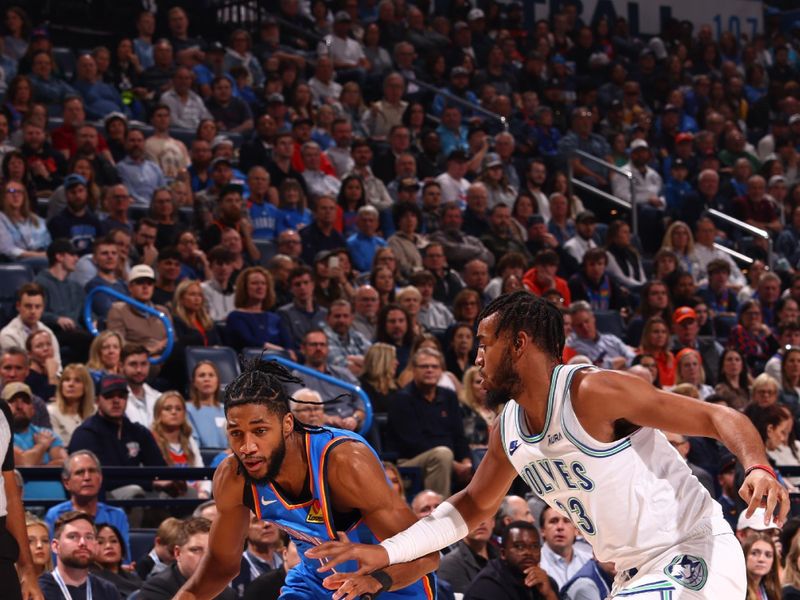 OKLAHOMA CITY, OK - JANUARY 29: Isaiah Joe #11 of the Oklahoma City Thunder handles the ball during the game against the Minnesota Timberwolves on January 29, 2024 at Paycom Arena in Oklahoma City, Oklahoma. NOTE TO USER: User expressly acknowledges and agrees that, by downloading and or using this photograph, User is consenting to the terms and conditions of the Getty Images License Agreement. Mandatory Copyright Notice: Copyright 2024 NBAE (Photo by Zach Beeker/NBAE via Getty Images)