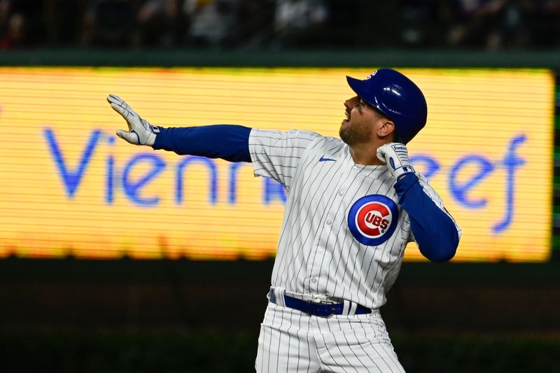 Jul 19, 2023; Chicago, Illinois, USA;  Chicago Cubs center fielder Mike Tauchman (40) gestures after he hits an RBI double against the Washington Nationals during the fourth inning at Wrigley Field. Mandatory Credit: Matt Marton-USA TODAY Sports