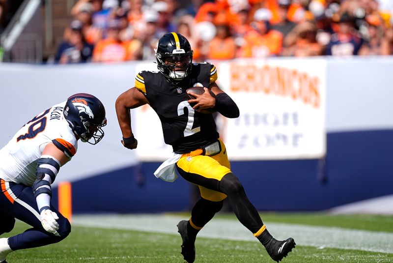 Pittsburgh Steelers quarterback Justin Fields (2) during the first half of an NFL football game against the Denver Broncos, Sunday, Sept. 15, 2024, in Denver. (AP Photo/David Zalubowski)