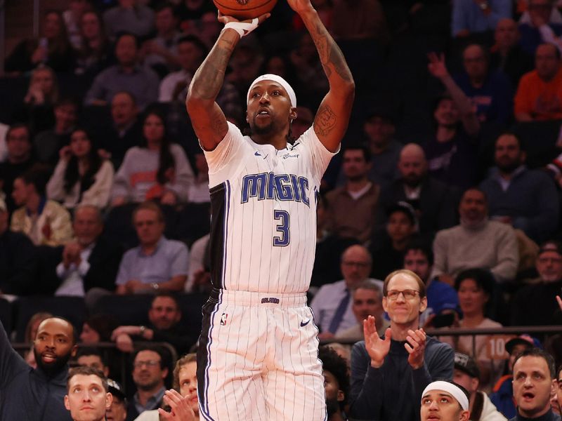 NEW YORK, NEW YORK - DECEMBER 03: Kentavious Caldwell-Pope #3 of the Orlando Magic shoots against the New York Knicks during their game at Madison Square Garden on December 03, 2024 in New York City.   User expressly acknowledges and agrees that, by downloading and or using this photograph, User is consenting to the terms and conditions of the Getty Images License Agreement.  (Photo by Al Bello/Getty Images)