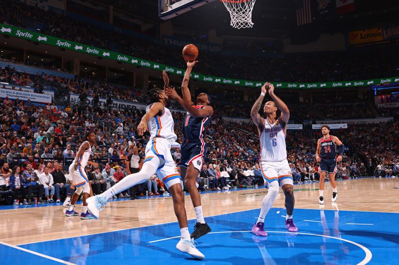 OKLAHOMA CITY, OK - FEBRUARY 23: Bilal Coulibaly #0 of the Washington Wizards drives to the basket during the game against the Oklahoma City Thunder on February 23, 2024 at Paycom Arena in Oklahoma City, Oklahoma. NOTE TO USER: User expressly acknowledges and agrees that, by downloading and or using this photograph, User is consenting to the terms and conditions of the Getty Images License Agreement. Mandatory Copyright Notice: Copyright 2024 NBAE (Photo by Zach Beeker/NBAE via Getty Images)