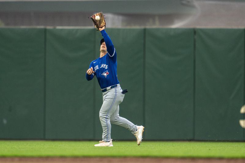Jul 9, 2024; San Francisco, California, USA;  Toronto Blue Jays left fielder Davis Schneider (36) fields a fly ball hit by San Francisco Giants second baseman Thairo Estrada (not pictured) during the third inning at Oracle Park. Mandatory Credit: Neville E. Guard-USA TODAY Sports
