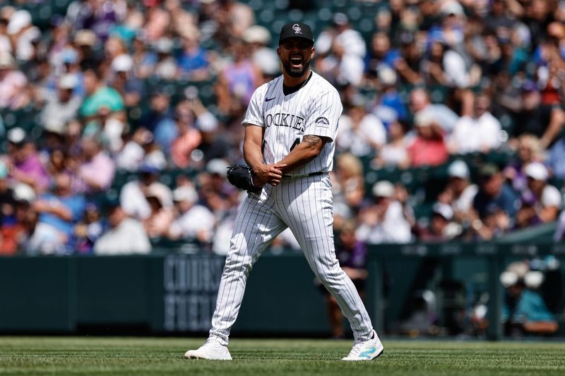 Jun 20, 2024; Denver, Colorado, USA; Colorado Rockies relief pitcher Anthony Molina (43) reacts after a play in the seventh inning against the Los Angeles Dodgers at Coors Field. Mandatory Credit: Isaiah J. Downing-USA TODAY Sports