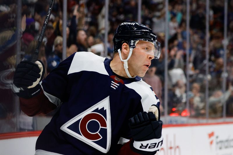 Feb 18, 2024; Denver, Colorado, USA; Colorado Avalanche defenseman Jack Johnson (3) celebrates after his goal in the second period against the Arizona Coyotes at Ball Arena. Mandatory Credit: Isaiah J. Downing-USA TODAY Sports