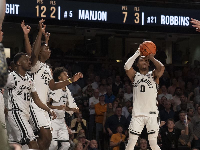 Feb 8, 2023; Nashville, Tennessee, USA;   Vanderbilt Commodores guard Tyrin Lawrence (0) shoots a three point basket at the buzzer to defeat the Tennessee Volunteers 66 to 65 at Memorial Gymnasium.  Mandatory Credit: George Walker IV - USA TODAY Sports